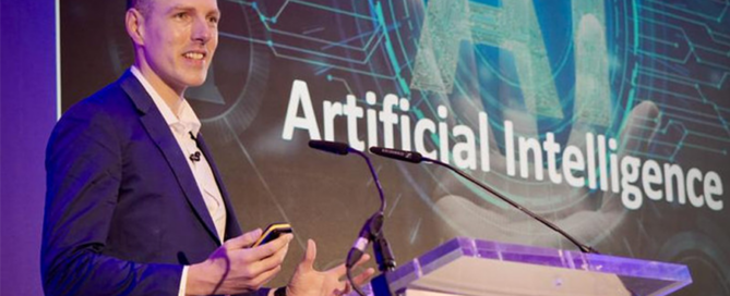 Mark Kelly speaking at a corporate event