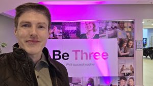 Mark Kelly outside entrance to Three event Mark Kelly AI Innovation Speaker. Selfie outside of the entrance to the Three Ireland Event which he did a Keynote on