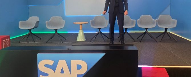 Mark Kelly standing on the SAP Ireland stage before delivering a keynote presentation. AI Keynote Speaker 2026