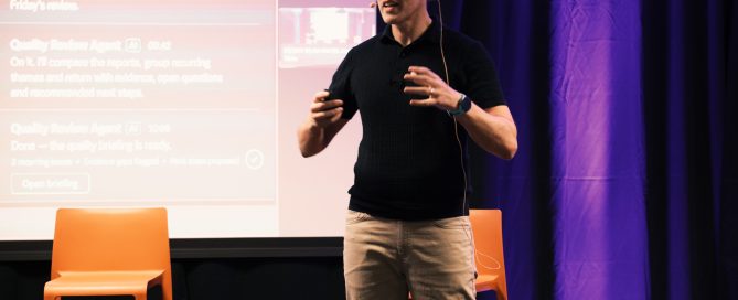 Mark Kelly delivering an AI keynote on practical AI skills to a Medtronic team