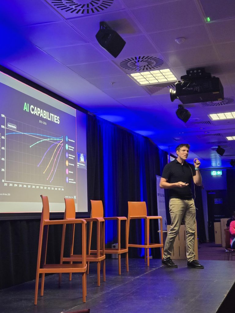 Mark Kelly speaking to Medtronic engineers and managers about using AI responsibly
