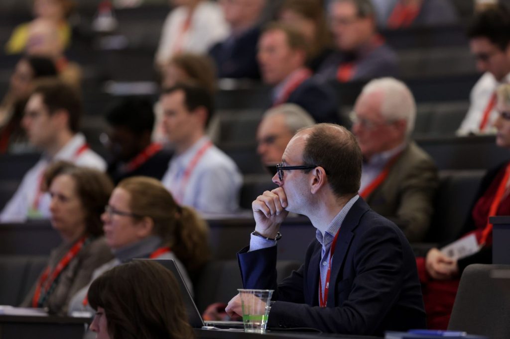 Healthcare leaders listening to a session on AI at the RCSI National Healthcare Outcomes Conference
